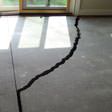 a huge crack in a concrete slab floor in Glendale
