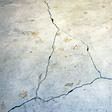 foundation heaving cracks in a slab floor in Chandler