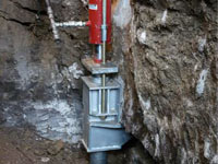 Foundation repair contractors lifting a structure in Tucson.