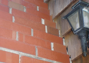 a repaired chimney in Avondale that had shown serious foundation damage and was repaired with a helical pier system.