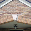 Major tuckpointing on a home archway over a door, with tuckpointing several inches wide that has failed on a Phoenix home