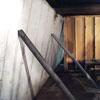 Temporary foundation wall supports stabilizing a Mesa home