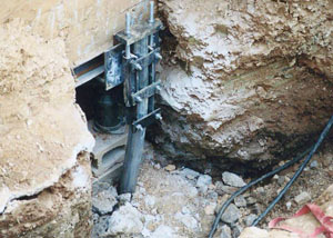 a bent, failed foundation push pier installed in Glendale.